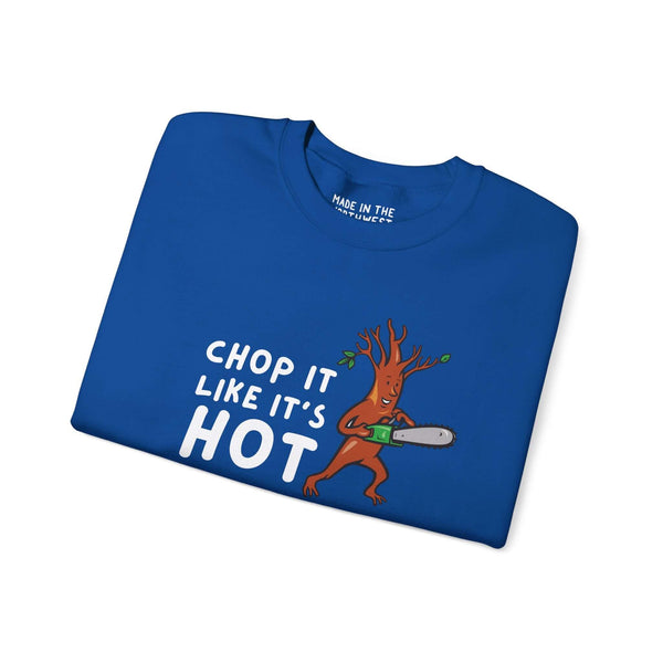 Chop It Like It's Hot unisex sweatshirt featuring a fun tree character with a chainsaw on a blue background.