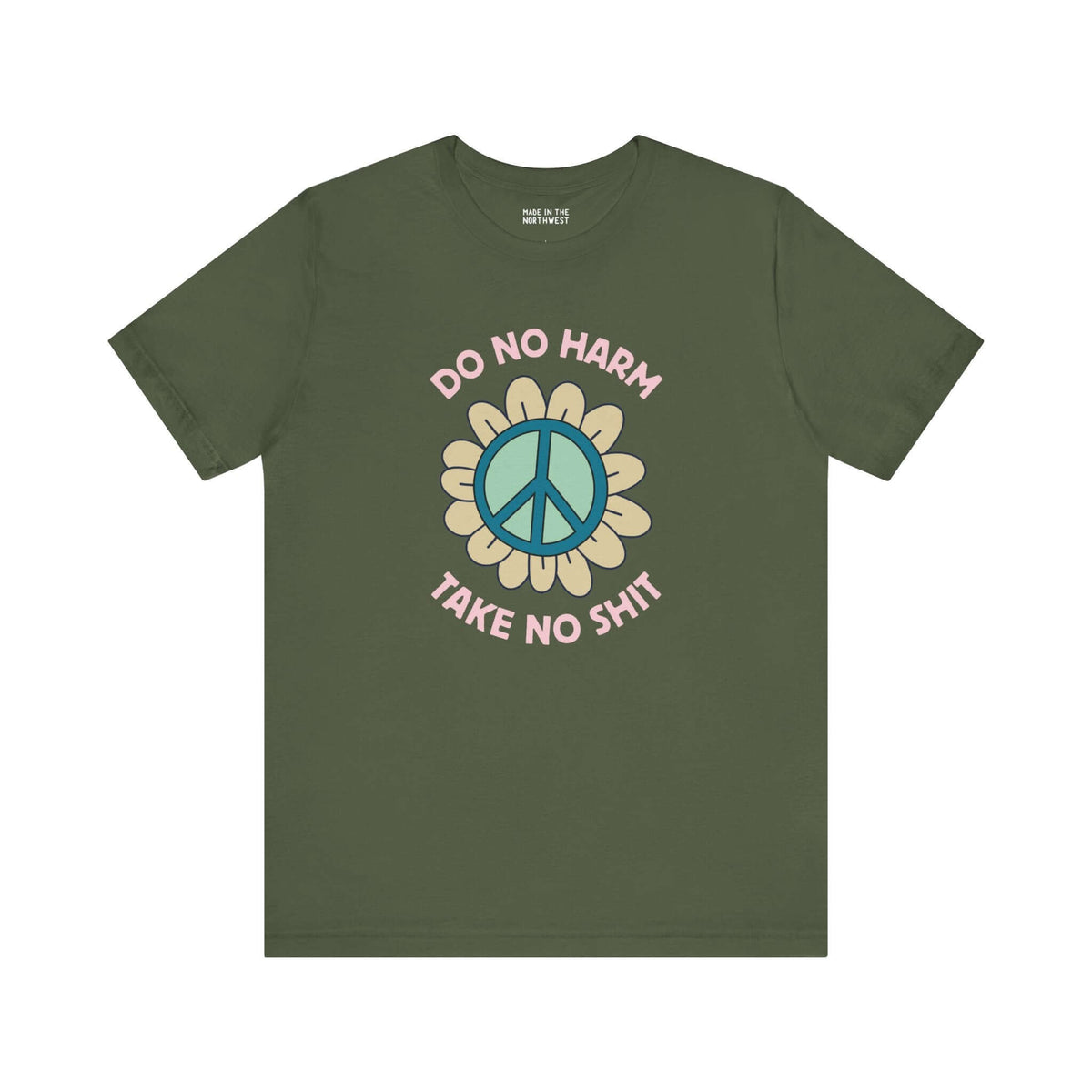 Green premium soft tee with 'Do No Harm, Take No Sh!t' design and peace flower graphic.