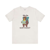 Hike the Northwest T Shirt featuring a bear with a backpack and map, perfect for outdoor adventures.
