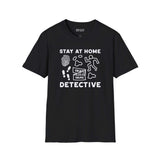 Stay at Home Detective T Shirt featuring playful crime scene graphics and bold text.