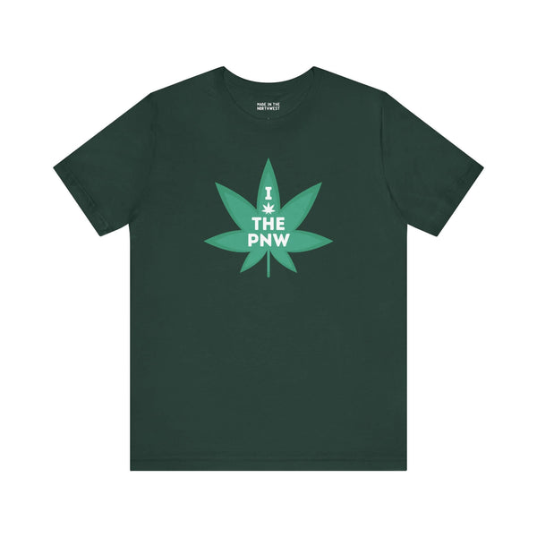 Green 'I Weed the PNW' tee with marijuana leaf graphic, celebrating Pacific Northwest vibes and nature-loving spirit.