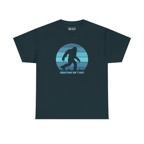 Squatchin' Ain't Easy athletic tee featuring Bigfoot silhouette and playful design on navy background.