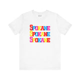 Bold Spokane soft tee with colorful block-letter design, perfect for fans of Lilac City, available in multiple colors.