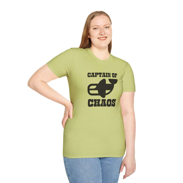 Woman wearing Captain of Chaos Orca Softstyle T-Shirt in light green, showcasing playful design and bold lettering.
