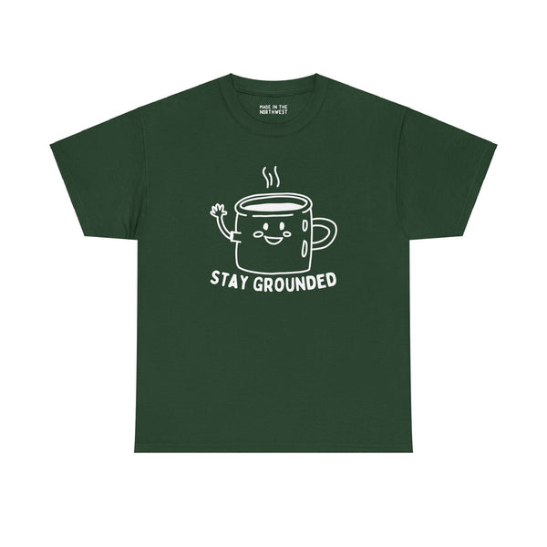 "Stay Grounded and Caffeinated Tee featuring a waving coffee mug design on a green shirt for coffee lovers"