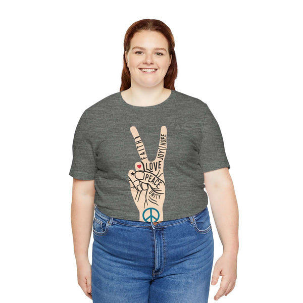 Power in Peace premium soft tee featuring a hand peace sign with words of love, hope, and unity, promoting positivity.