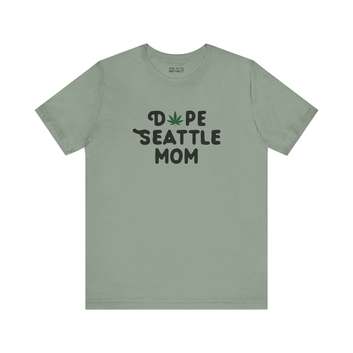 Dope Seattle Mom premium soft tee with playful marijuana leaf logo on a green background.