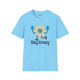 Stay Groovy T Shirt with a fun retro flower design and playful lettering in a cheerful blue color.