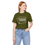 Person wearing green Vancouver Washington tee with state outline and tree icon, showcasing hometown pride and Pacific Northwest charm.