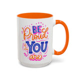 Bright ceramic mug featuring colorful hand-lettered design that says 