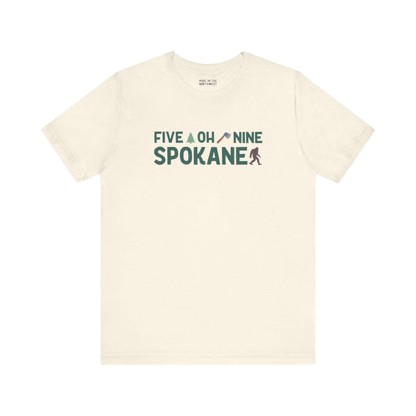 "Five Oh Nine Spokane soft tee with axe and tree design, celebrating Spokane pride and area code 509 hometown spirit"