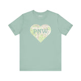Mint green premium soft tee with a topo map heart and 'PNW' design, perfect for Pacific Northwest lovers.