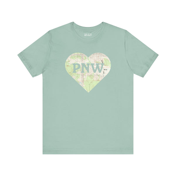 Mint green premium soft tee with a topo map heart and 'PNW' design, perfect for Pacific Northwest lovers.