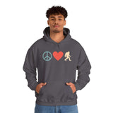 Peace, Love, and Bigfoot Cozy Hoodie showcasing playful design with peace sign, heart, and Bigfoot silhouette.