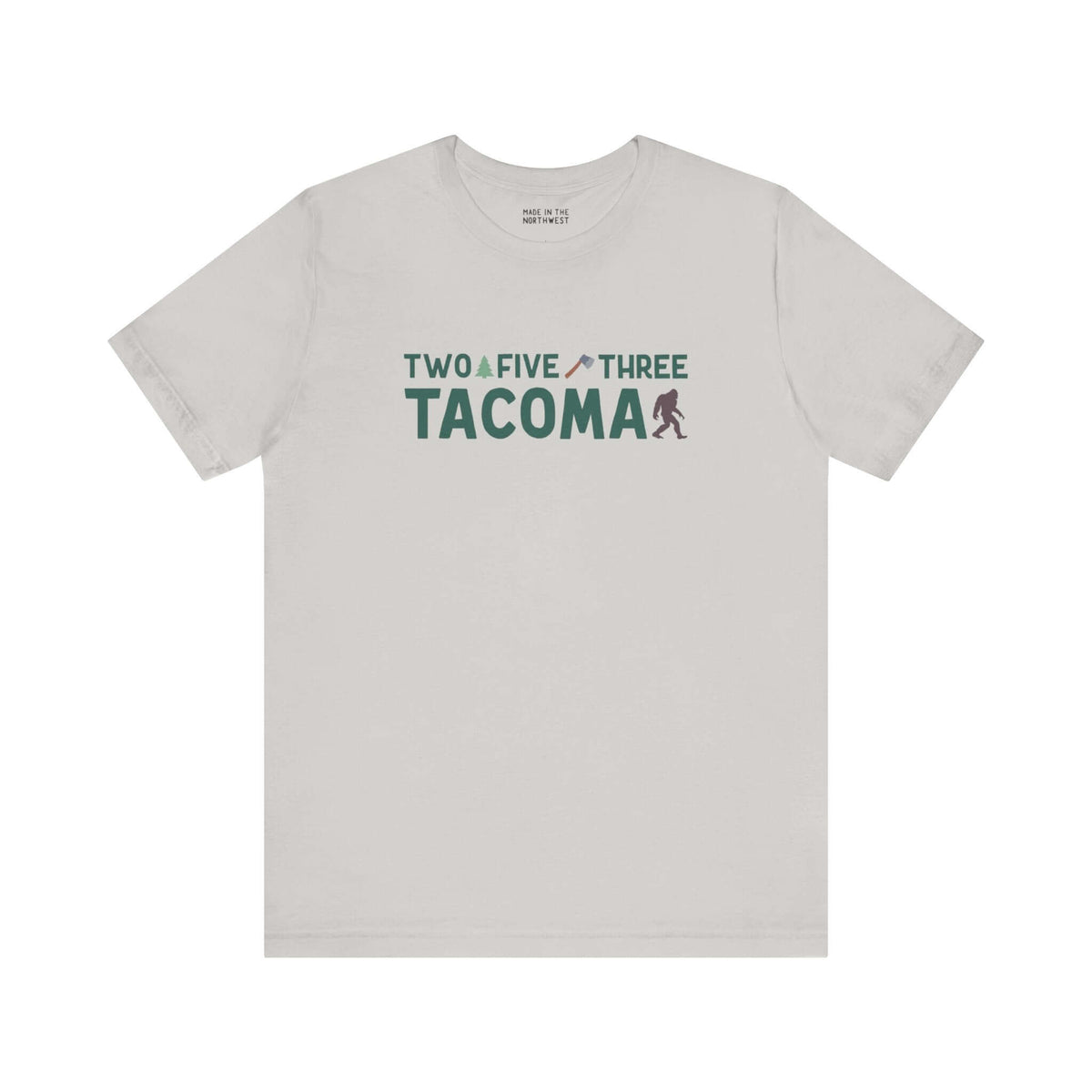 "Two Five Three Roots Soft Tee with Tacoma pride design, featuring area code text and small axe and tree graphic on a light shirt."