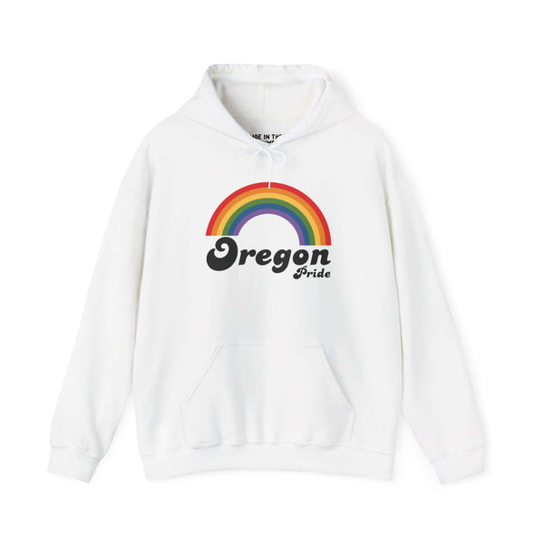 White hoodie featuring a vibrant rainbow graphic and 'Oregon Pride' text, celebrating inclusivity and love.