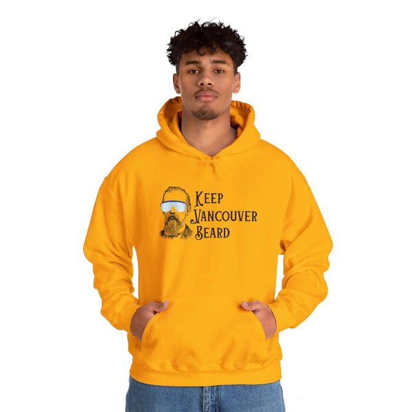 Young man wearing a yellow Keep Vancouver Beard hoodie, featuring a vintage bearded icon and bold text.