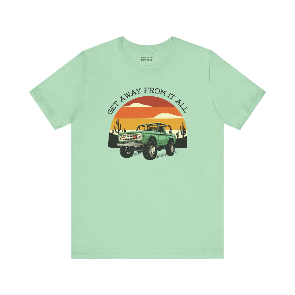 Mint green soft tee featuring a vintage Bronco design and sunset graphics for adventure lovers.