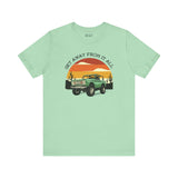 Mint green soft tee featuring a vintage Bronco design and sunset graphics for adventure lovers.