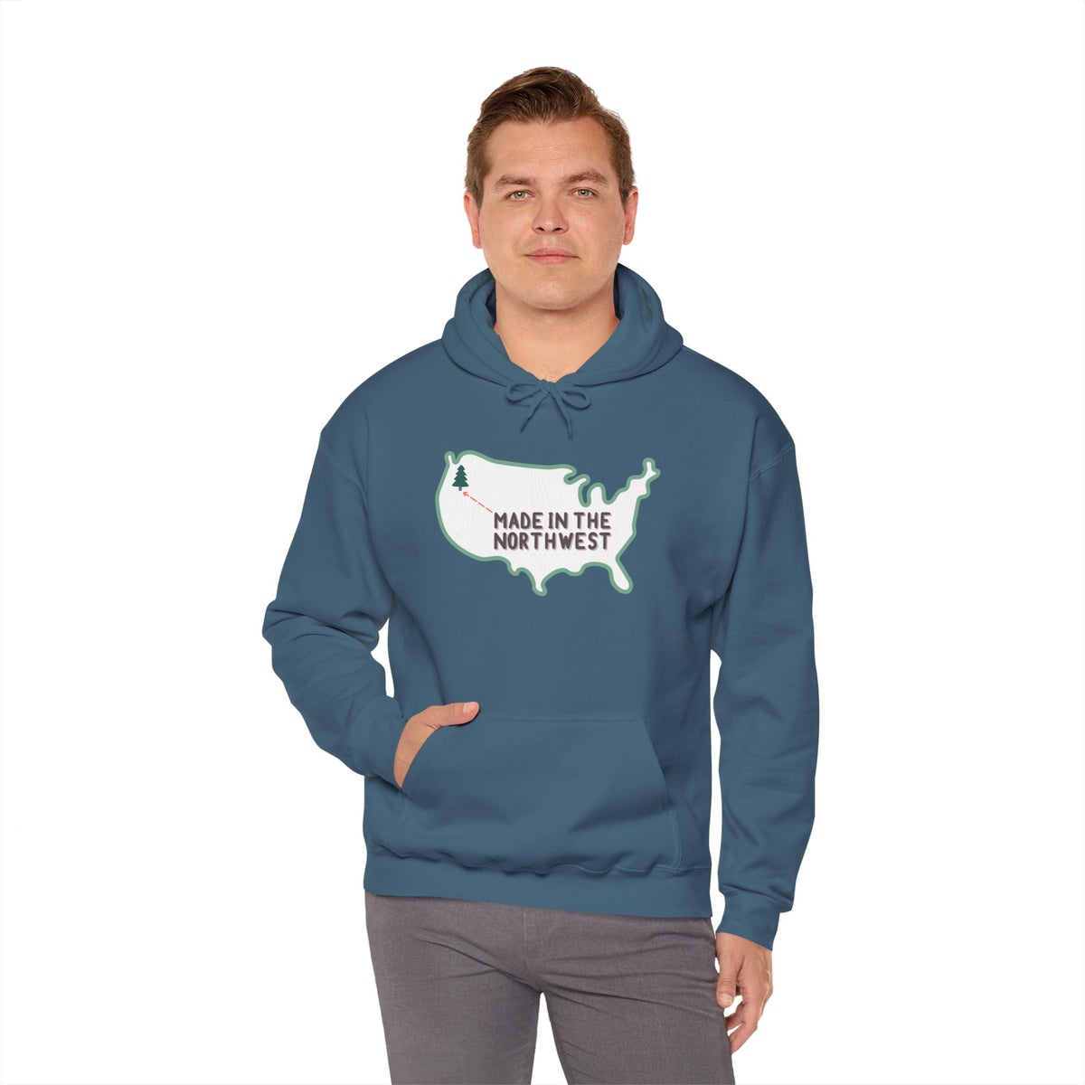 Man wearing Evergreen is Where It's At cozy hoodie featuring woodgrain map and 'Made in the Northwest' text.
