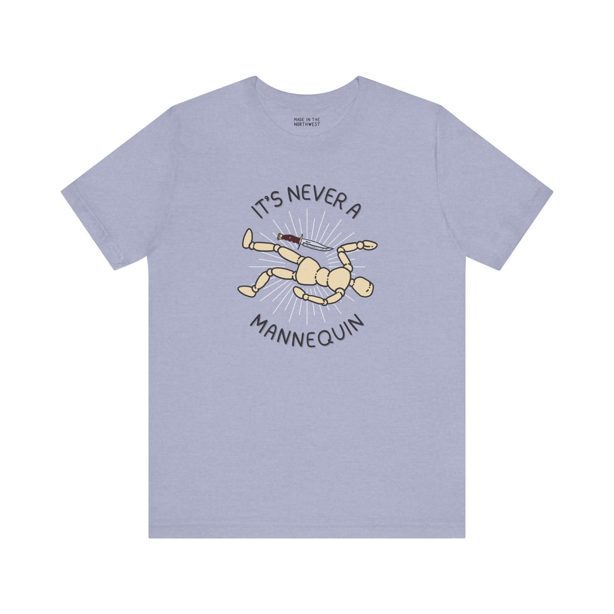 Light blue soft tee featuring 'It's Never a Mannequin' design, perfect for true crime fans.