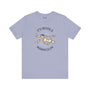 Light blue soft tee featuring 'It's Never a Mannequin' design, perfect for true crime fans.
