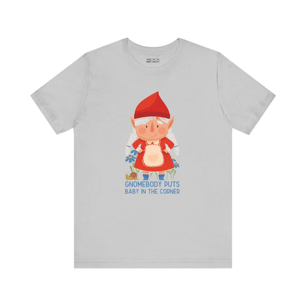 Gnomebody Puts Baby in the Corner soft tee featuring a playful gnome design and humorous text.