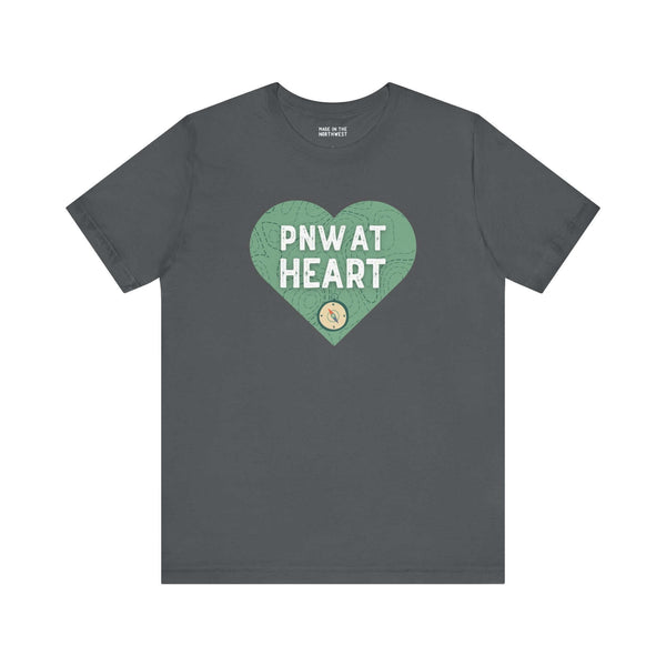 PNW at Heart Compass Soft Tee with compass design on charcoal gray fabric, showcasing love for the Pacific Northwest.