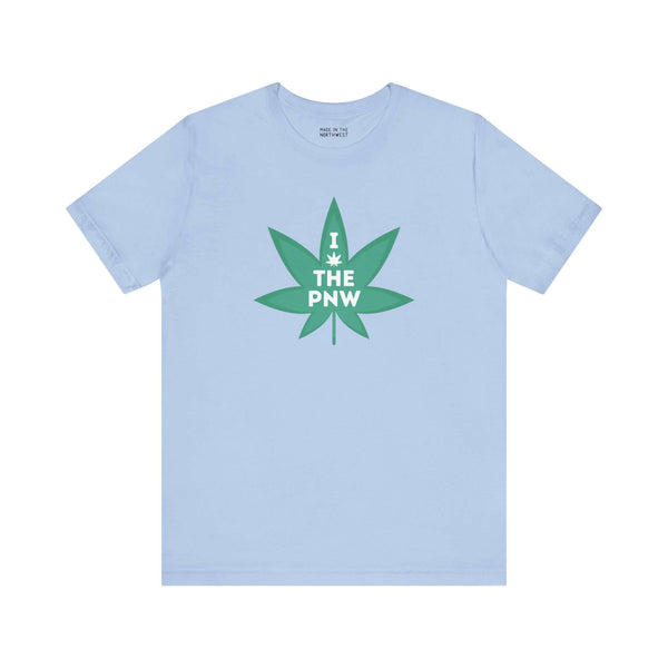 Light blue tee with "I (Weed) the PNW" graphic, featuring a green marijuana leaf, celebrating Pacific Northwest vibes.