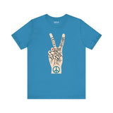 Power in Peace Premium Soft Tee featuring a hand making a peace sign with uplifting words promoting positivity.