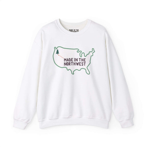 Evergreen is Where It's At Sweatshirt Show your love for the Pacific Northwest with our exclusive "Evergreen is Where it's At" sweatshirt. This design features the woodgrain United States with a tree marking the PNW location, highlighted by an arrow and t