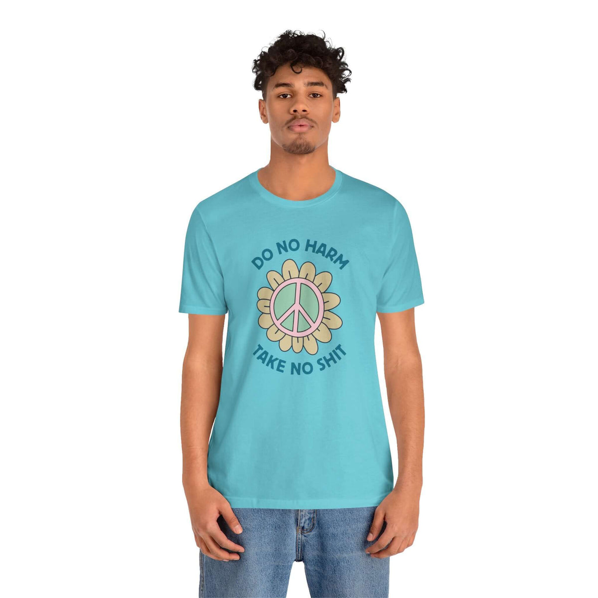 Premium soft tee with blue color, featuring a peace flower design and the phrase 'Do No Harm, Take No Shit'.
