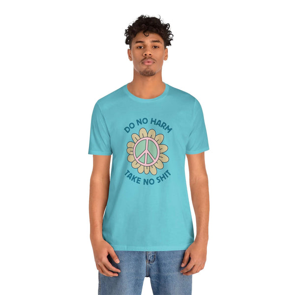 Premium soft tee with blue color, featuring a peace flower design and the phrase 'Do No Harm, Take No Shit'.