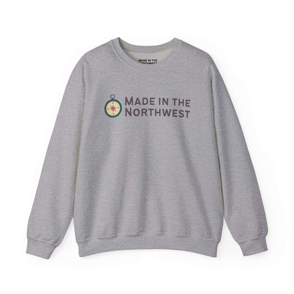 Made in the Northwest Sweatshirt featuring a sleek compass graphic in a cozy gray style.