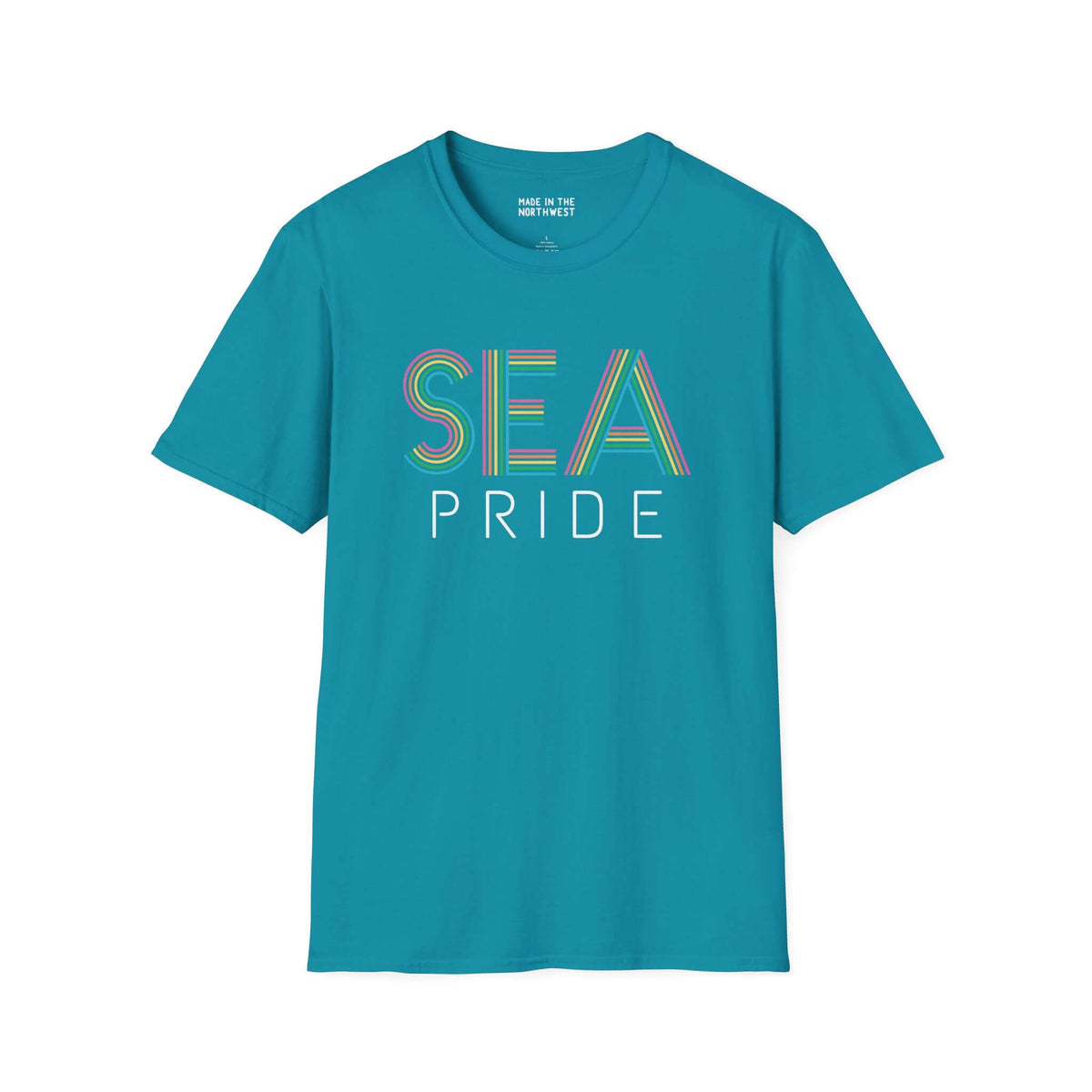 Bright teal SEA Pride t-shirt featuring colorful rainbow lettering representing Seattle's pride and community spirit.