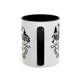The Mountains Are Calling and I Must Go Mug with black handle and alpine design.