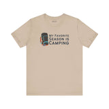 My Favorite Season is Camping Tee featuring a colorful backpack design on a beige shirt.