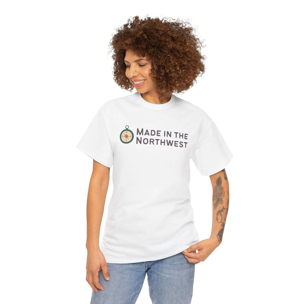 Model wearing a Made in the Northwest T Shirt with compass logo, showcasing Pacific Northwest pride.