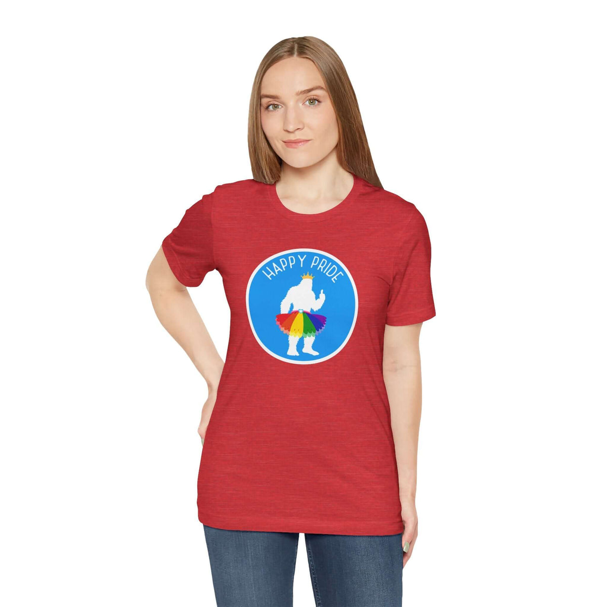 Model wearing a red tee with 'Happy Pride' graphic featuring Bigfoot in a rainbow tutu, celebrating Pride spirit.