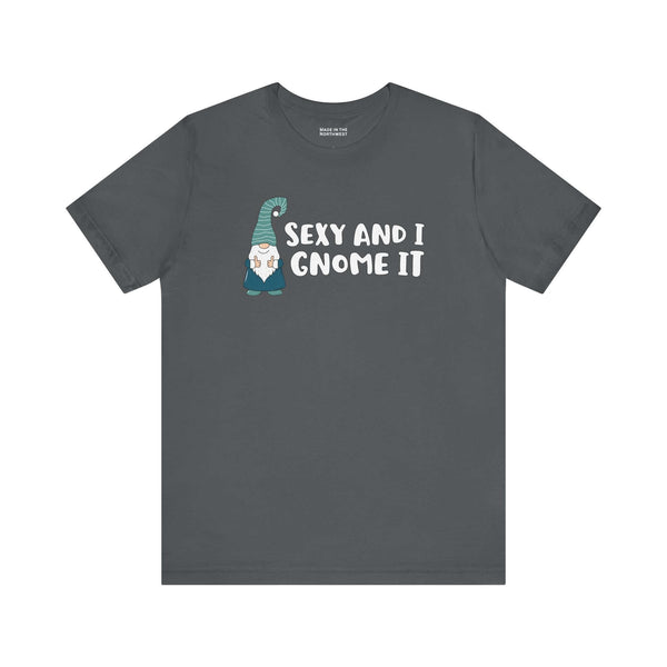 Sexy and I Gnome It Tee featuring a playful gnome illustration and cheeky hand-lettered phrase on a gray shirt.