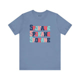 Bold and vibrant Spokane trio soft tee in blue with colorful block-letter design. Perfect for Spokane locals and fans.