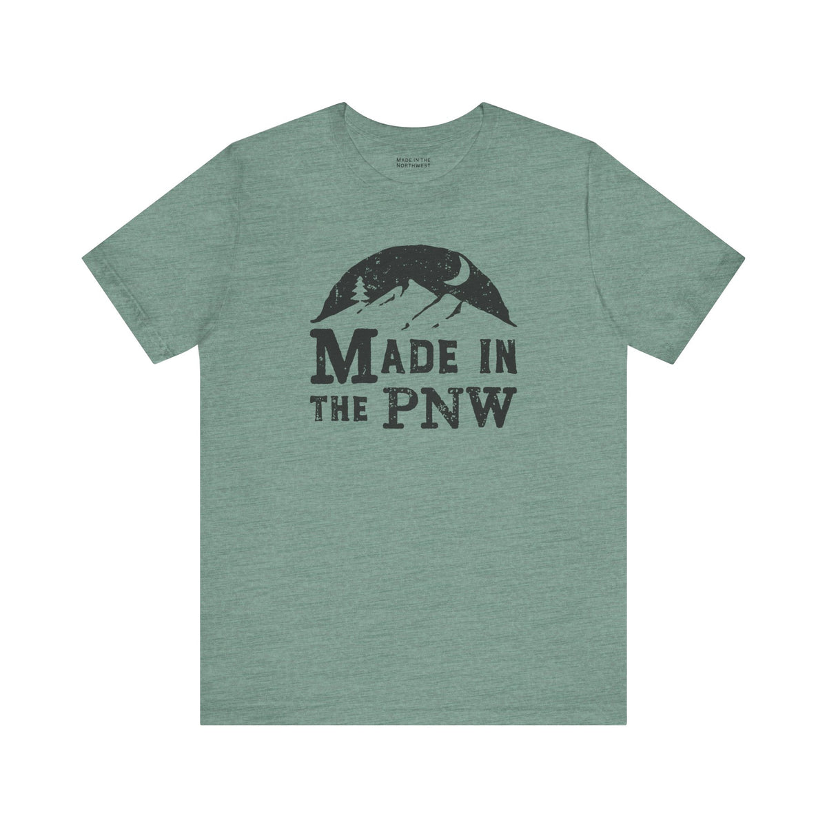 Made in the PNW T shirt featuring a mountain graphic on a green tee.