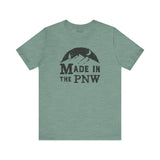 Made in the PNW T shirt featuring a mountain graphic on a green tee.