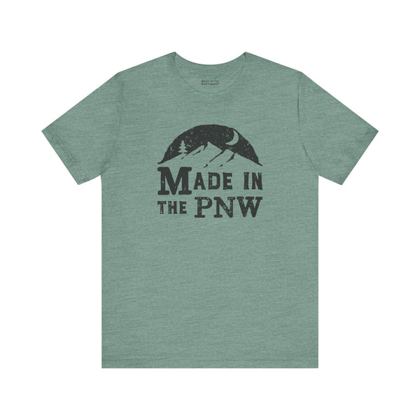 Made in the PNW T shirt featuring a mountain graphic on a green tee.