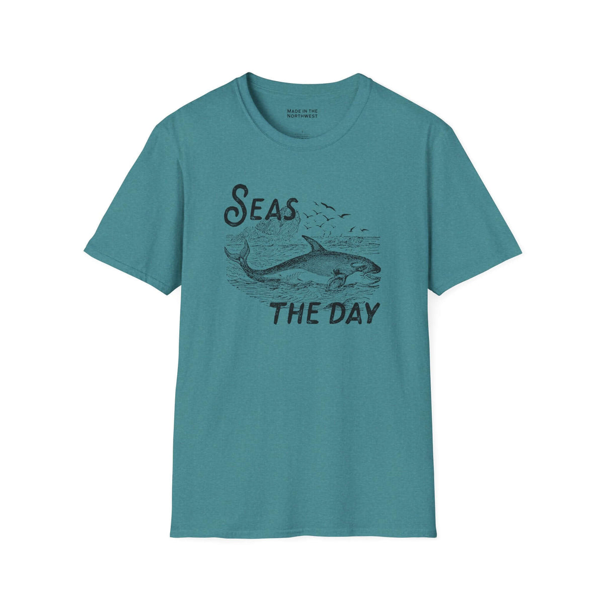 Seas the Day T Shirt featuring a playful design with an orca illustration on a teal background.