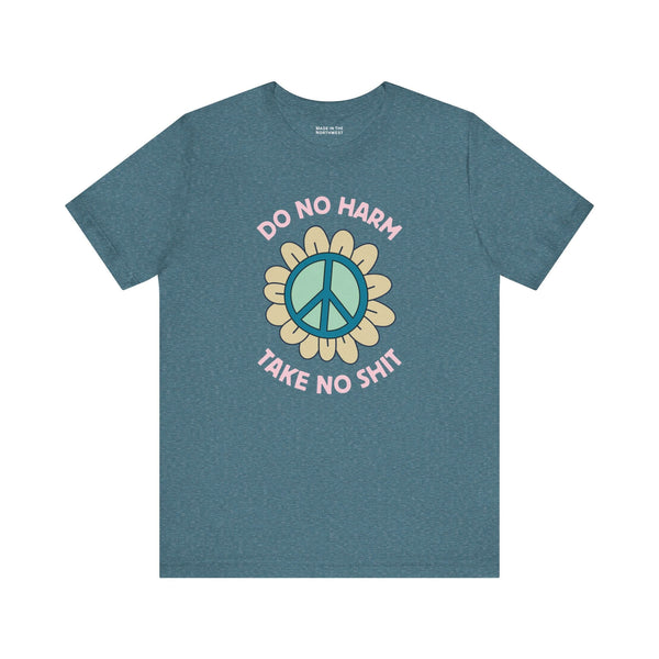Do No Harm Take No Shit Tee featuring a bold peace flower design on a blue shirt.