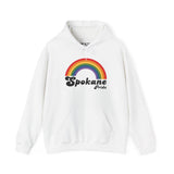 White hoodie featuring a colorful rainbow and Spokane Pride logo, celebrating love and inclusivity.