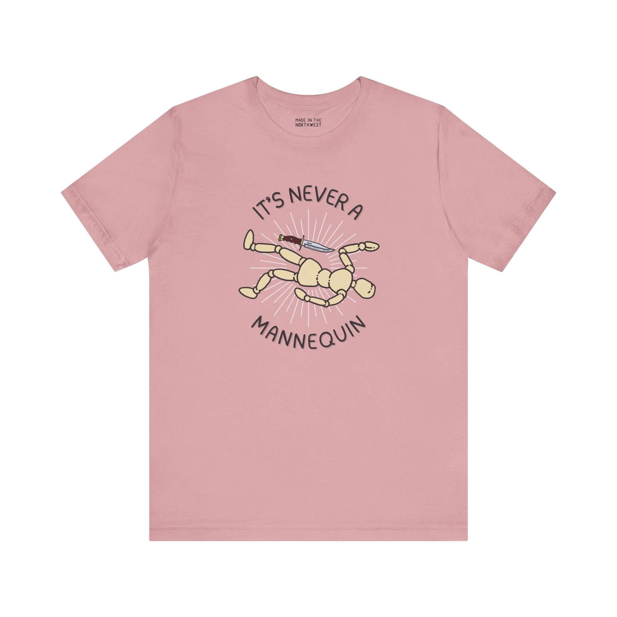 It's Never a Mannequin premium soft tee for true crime fans featuring a playful mannequin graphic.