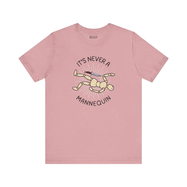 It's Never a Mannequin premium soft tee for true crime fans featuring a playful mannequin graphic.