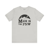 Made in the PNW T Shirt – Distressed Mountain Graphic Tee with mountain design on gray fabric.